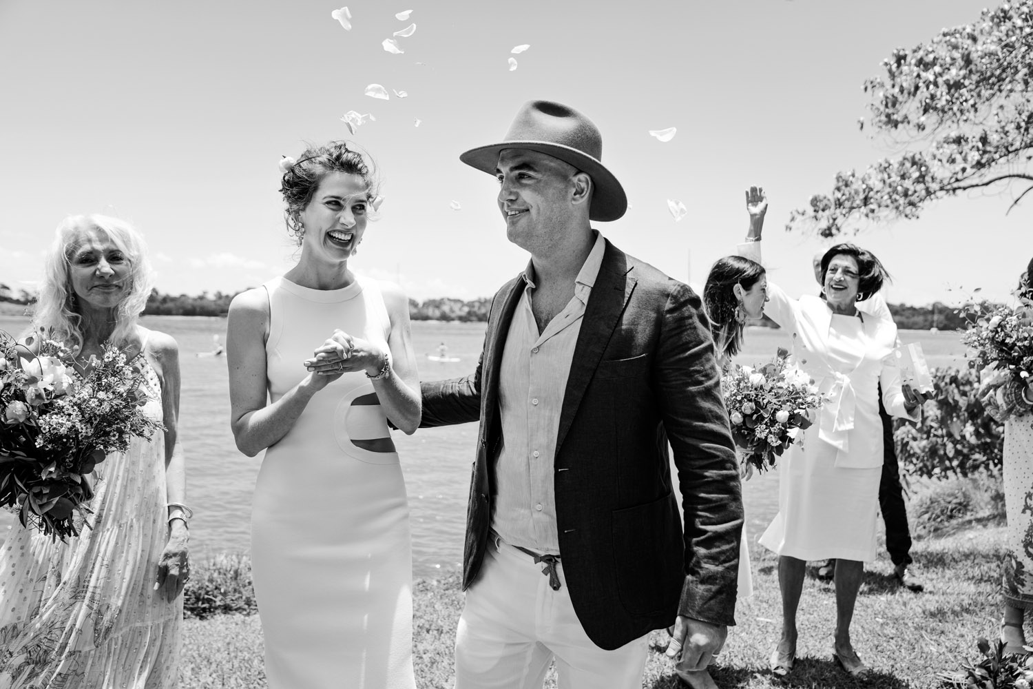 Noosa wedding photography of bride and grooms at Ricky's Restaurant by Noosa photographer