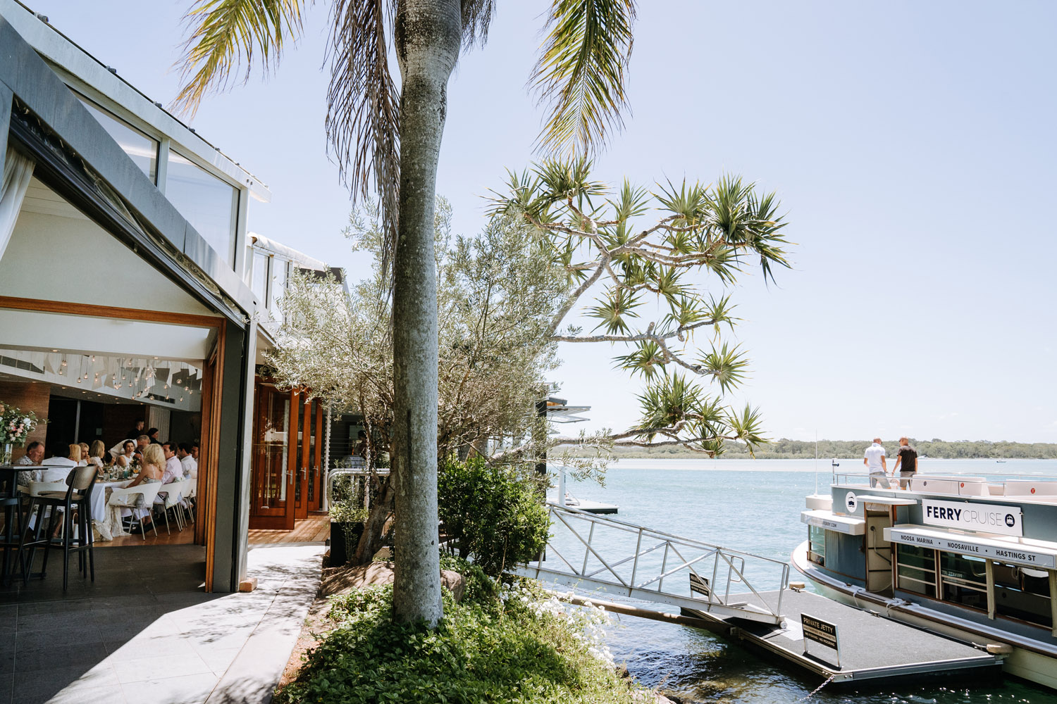 Noosa wedding photography of bride and grooms at Ricky's Restaurant by Noosa photographer