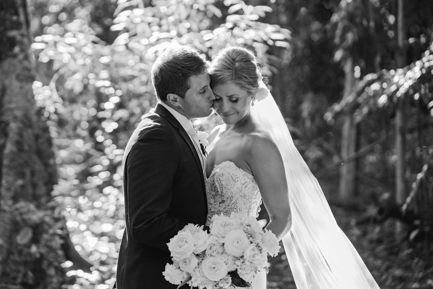 Noosa wedding photography of bride and grooms at Ricky's Restaurant by Noosa photographer